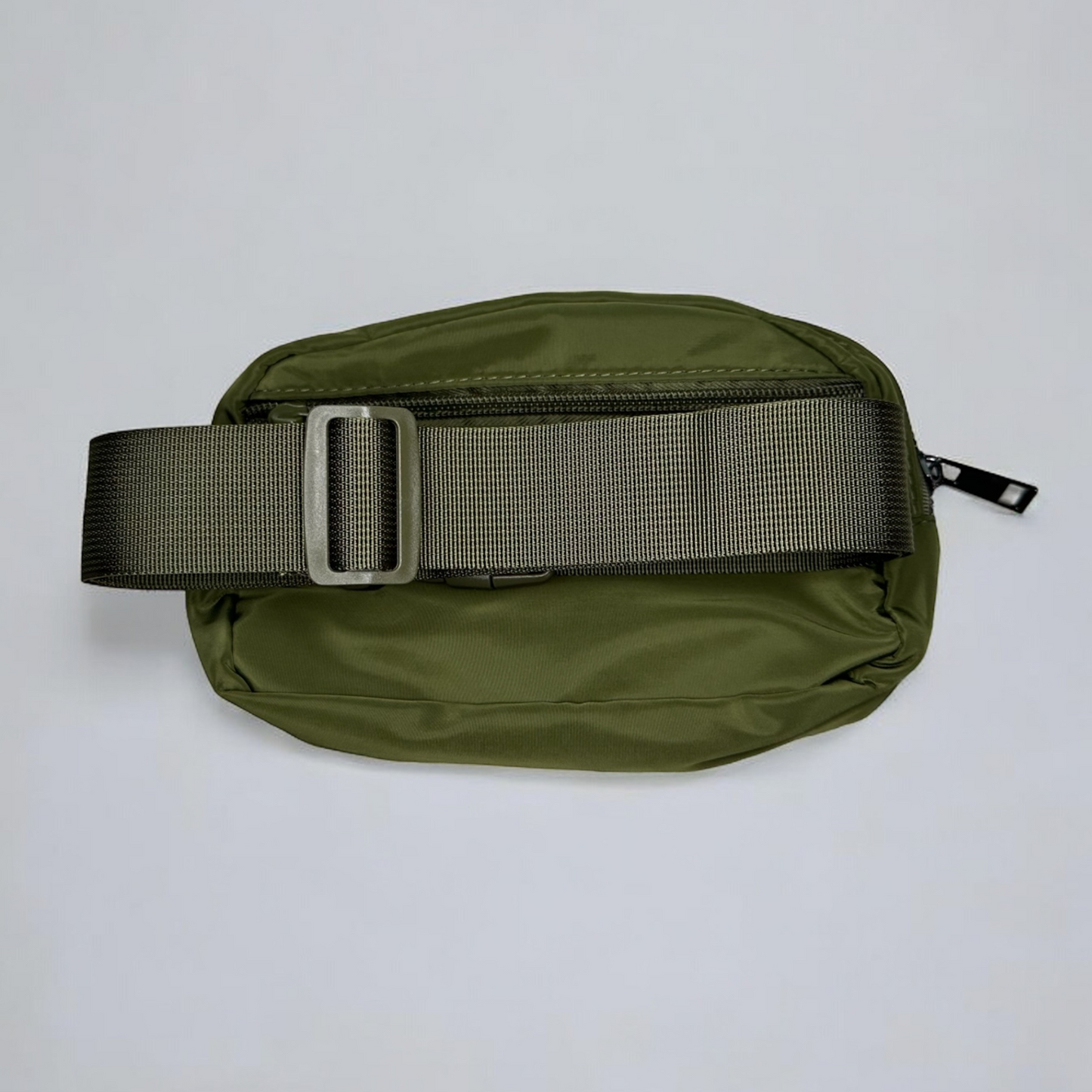 Single pouch bag with a compact design and spacious interior, perfect for carrying essentials, featuring durable material, stylish look, and a convenient adjustable strap.