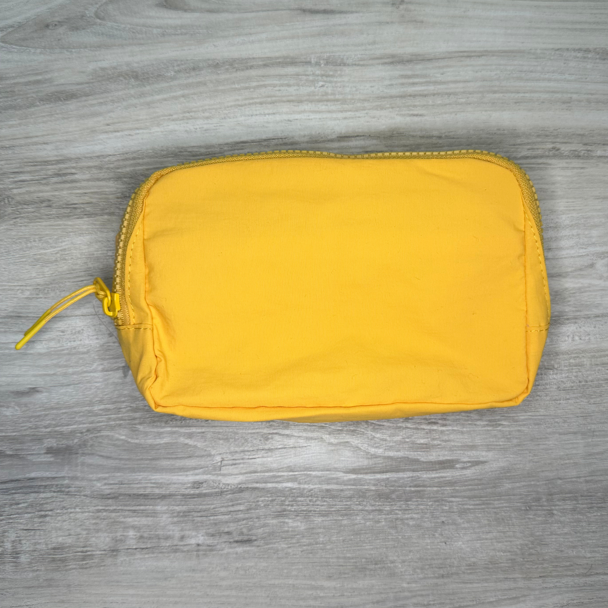 Single pouch bag with a compact design and spacious interior, perfect for carrying essentials, featuring durable material, stylish look, and a convenient adjustable strap.