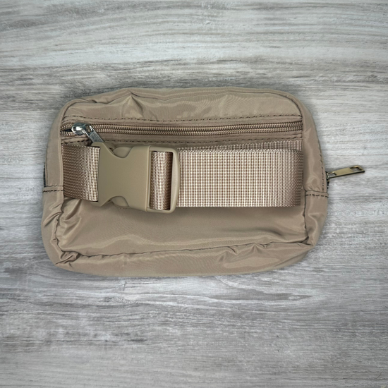 Single pouch bag with a compact design and spacious interior, perfect for carrying essentials, featuring durable material, stylish look, and a convenient adjustable strap.