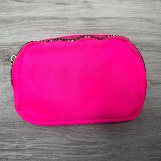 Single pouch bag with a compact design and spacious interior, perfect for carrying essentials, featuring durable material, stylish look, and a convenient adjustable strap.