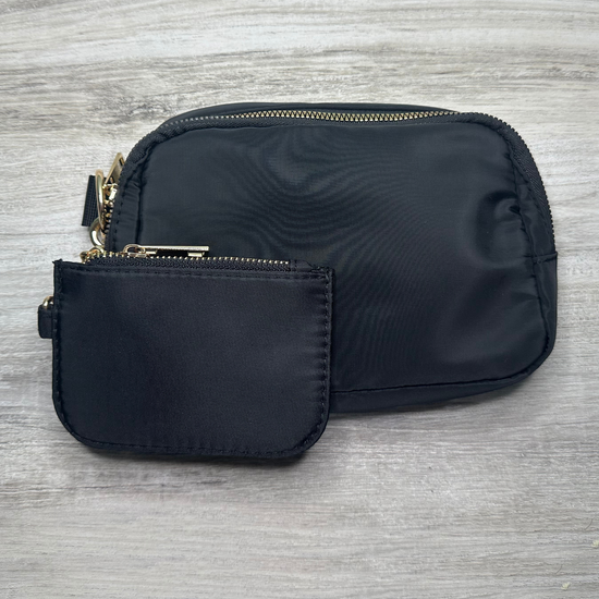 Single pouch bag with a compact design and spacious interior, perfect for carrying essentials, featuring durable material, stylish look, and a convenient adjustable strap.